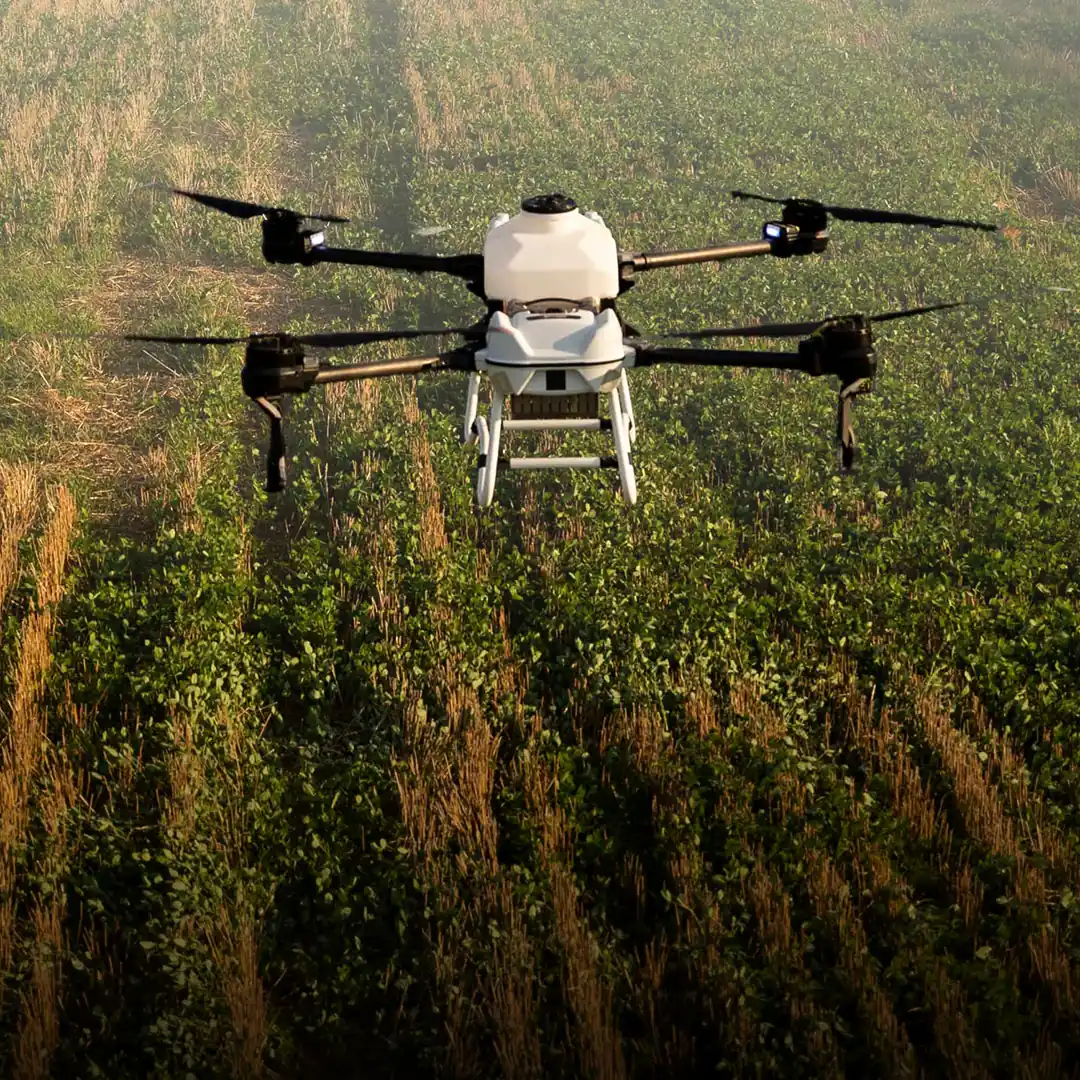 Ayre CX in flight over a field