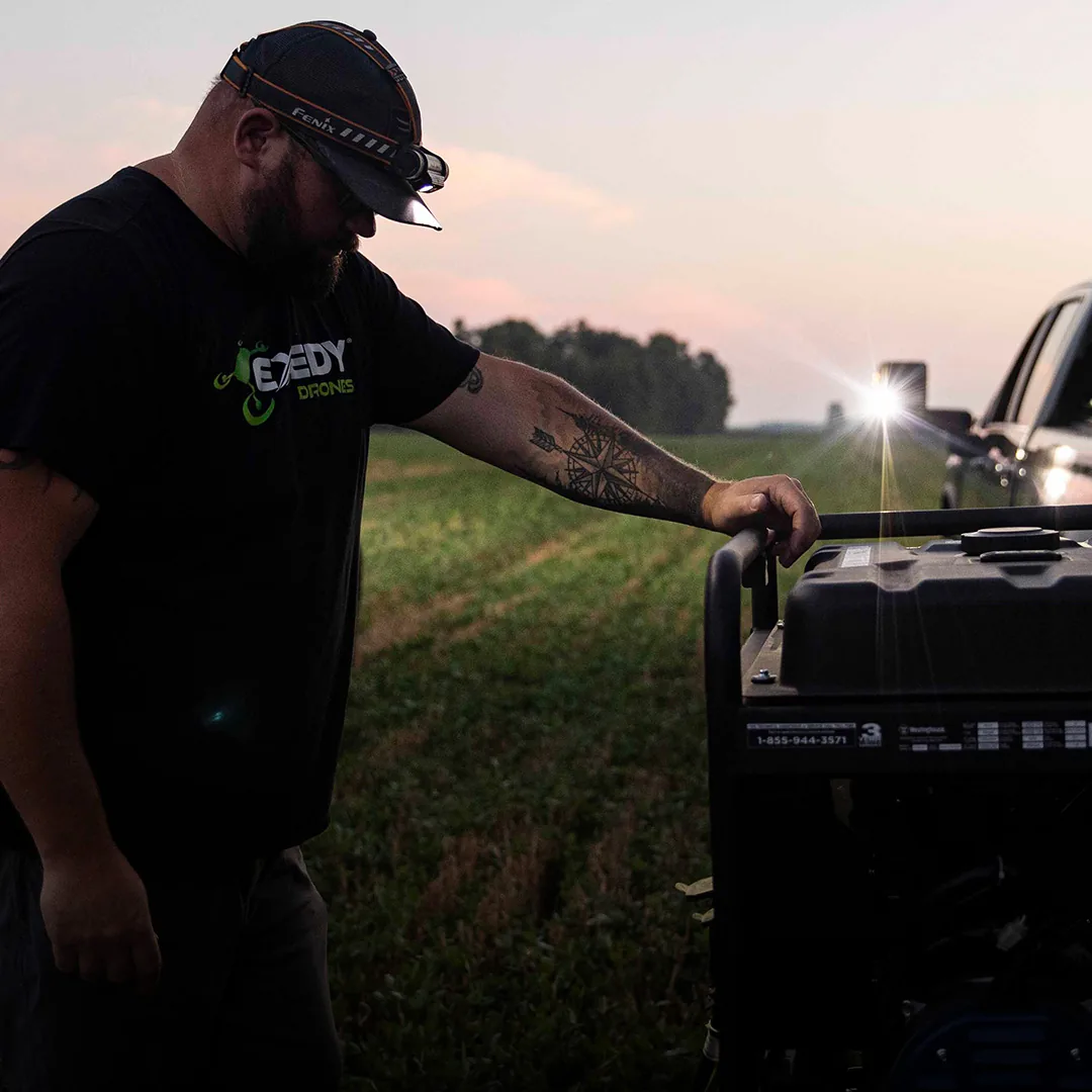 Exedy technician in the field at dusk